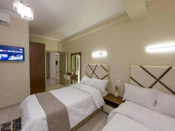 Chambre Triple avec Vue sur le Jardin